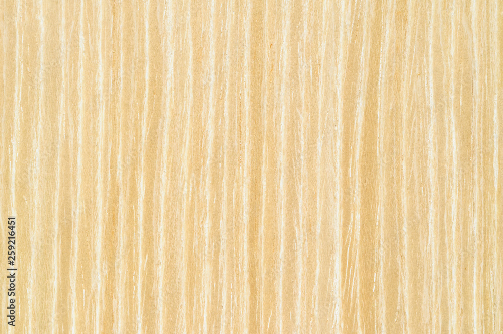Vertical texture of light brown oak veneer. Vertical texture of light brown oak veneer.