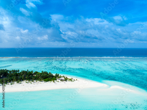 Fototapeta Naklejka Na Ścianę i Meble -  Beautiful aerial view of Maldives and tropical beach . Travel and vacation concept