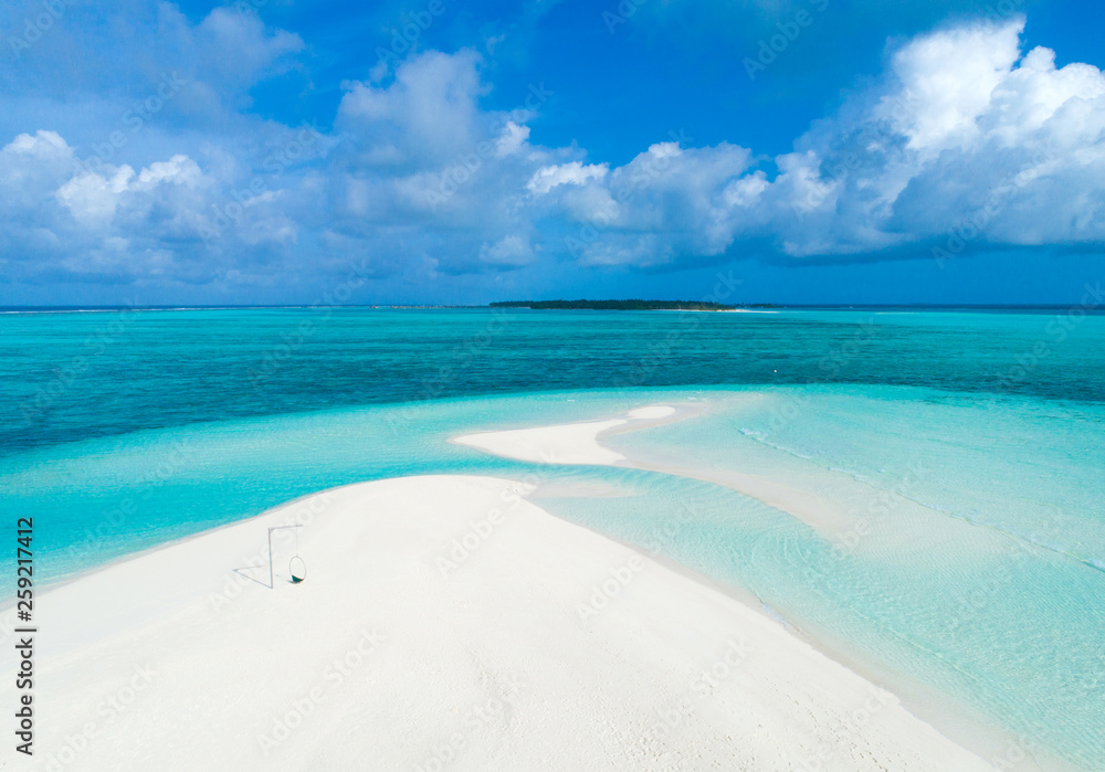 Obraz premium Beautiful aerial view of Maldives and tropical beach . Travel and vacation concept
