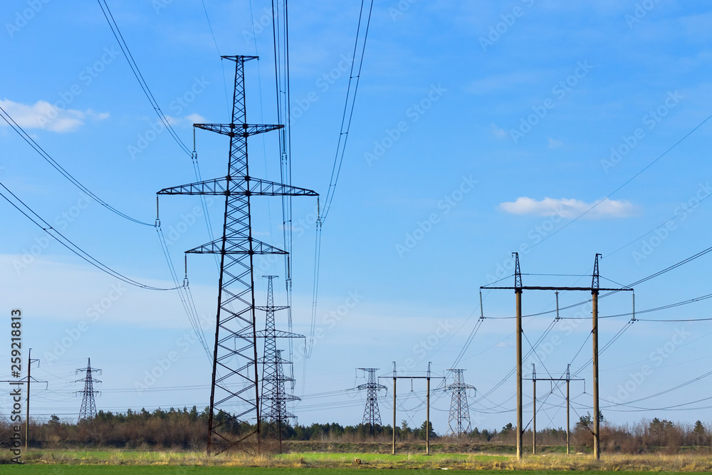 power line summer landscape / passing overhead electricity wire of the support carrying the light and the heat in the house power line summer landscape / passing overhead electricity wire of the support carrying the light and the heat in the house
