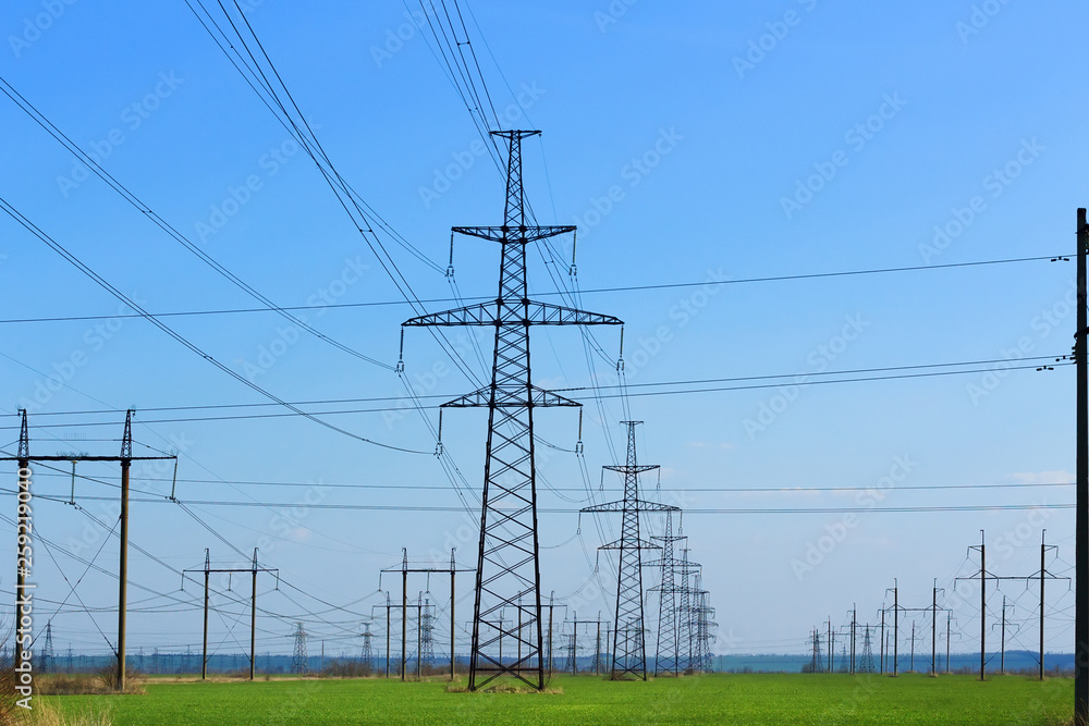 power line summer landscape / passing overhead electricity wire of the support carrying the light and the heat in the house power line summer landscape / passing overhead electricity wire of the support carrying the light and the heat in the house
