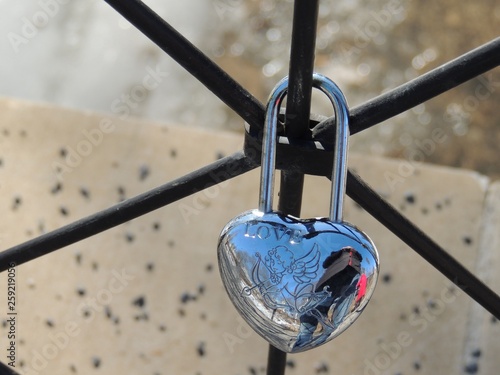 padlock and chain on fence
