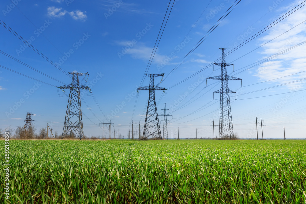 power line summer landscape / passing overhead electricity wire of the support carrying the light and the heat in the house power line summer landscape / passing overhead electricity wire of the support carrying the light and the heat in the house