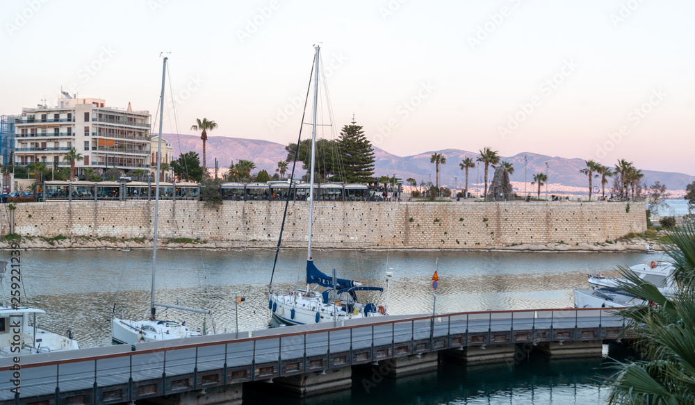 Obraz premium City of Pireas water front with sailboats and motor boats