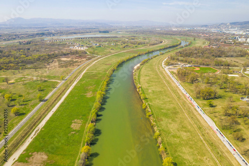Zagreb, Croatia, beautiful green recreation park area, around Sava river and lake Bundek, panoramic view from drone, city in background
