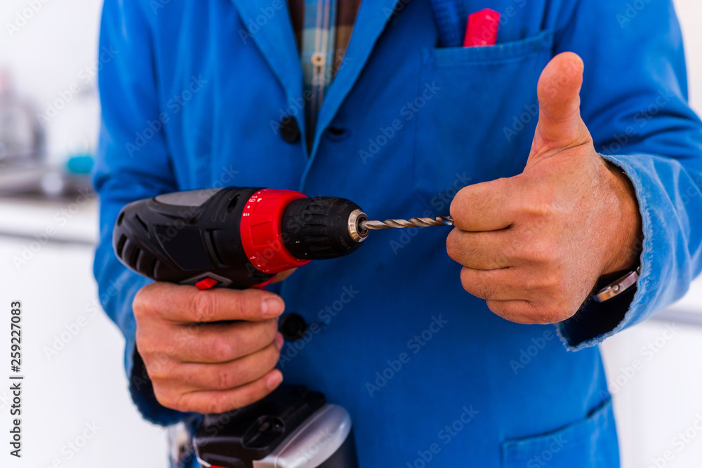 Mature serviceman with his drill show thumbs up Mature serviceman with his drill show thumbs up