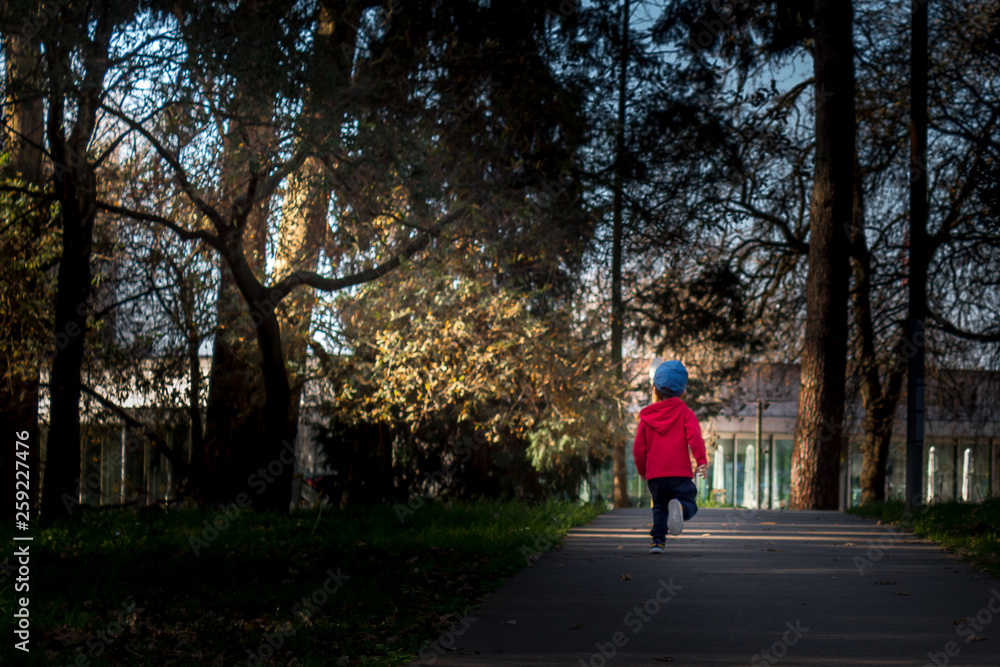 Boy running in the park