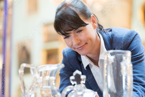 antiquarian inspecting the display