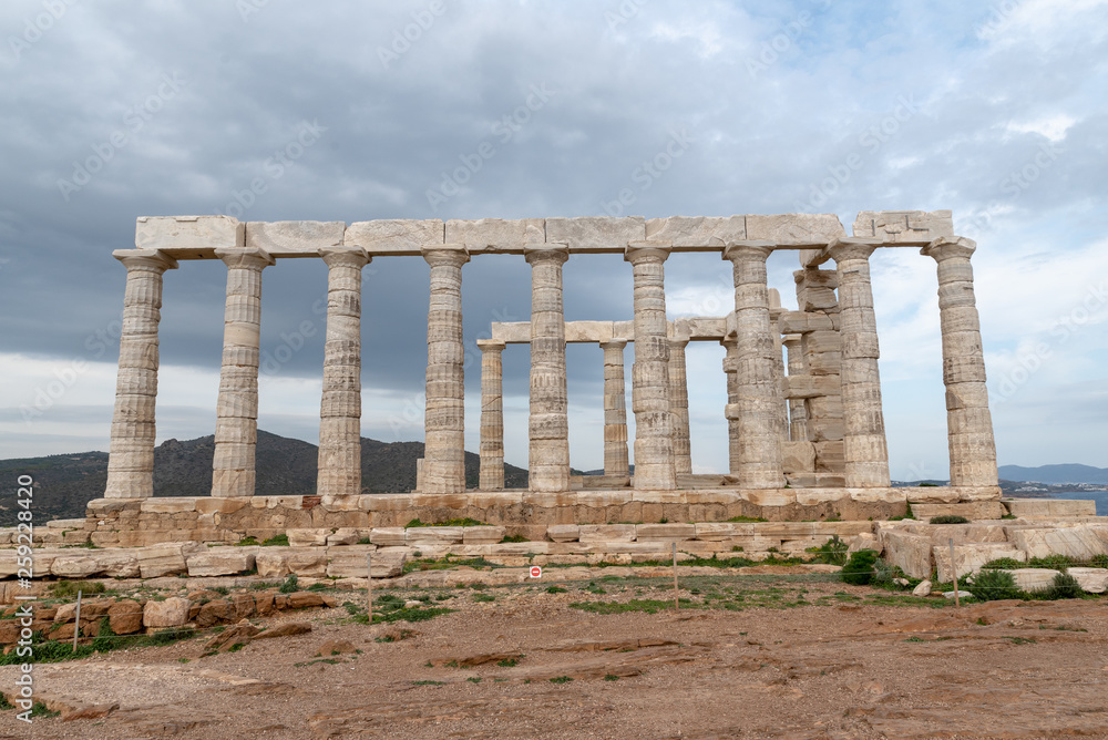 Greek temple vertical columns stone marble cliff