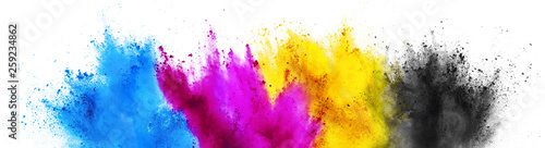 Photo colorful CMYK cyan magenta yellow key holi paint color powder explosion print co