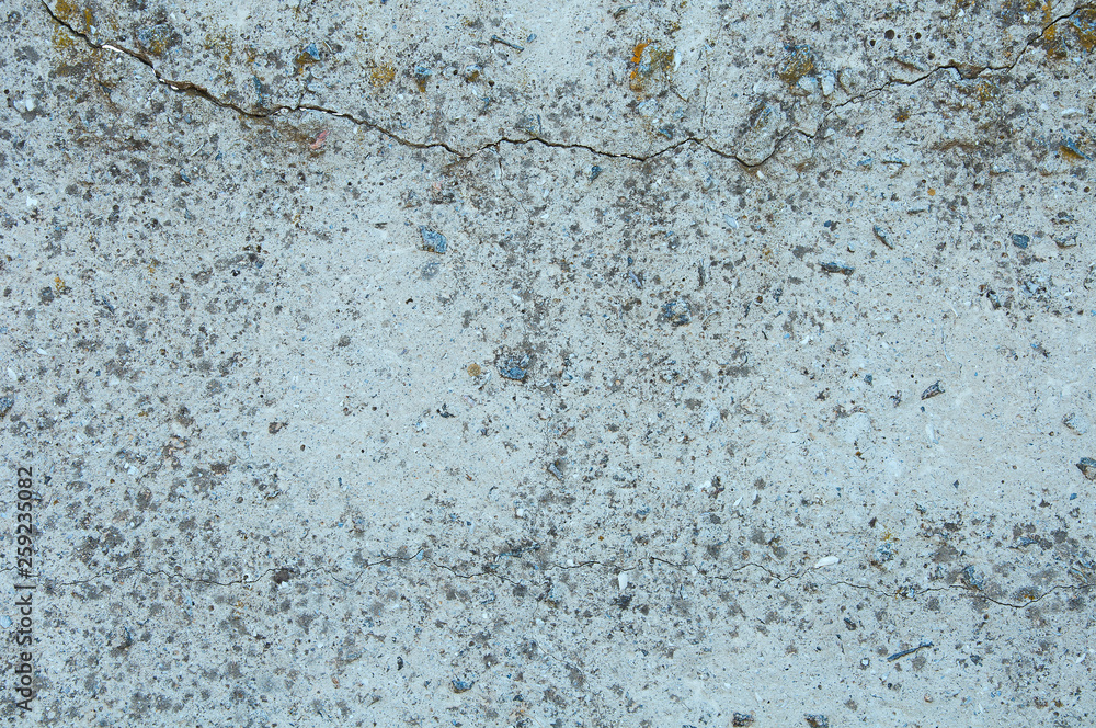 Obraz premium Gray concrete texture background. Damage. Cracked stone wall background.