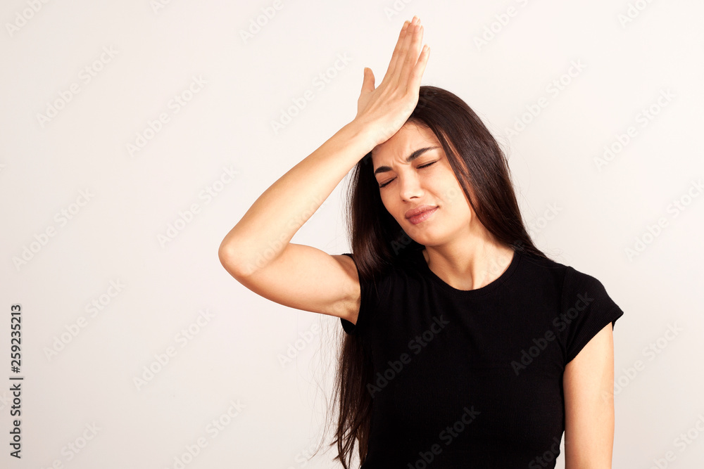 Portrait of young beautiful cute cheerful girl smiling looking at camera over white background Portrait of young beautiful cute cheerful girl smiling looking at camera over white background