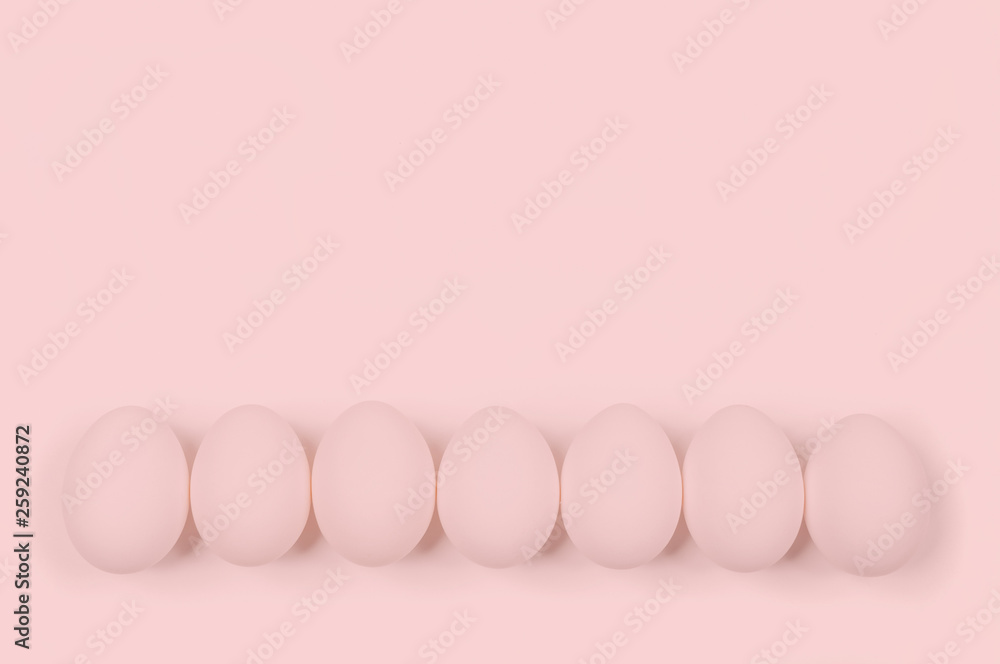 Pink egg. Raw eggs on pastel pink background.