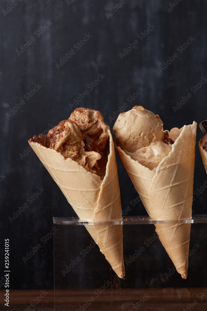 Ice cream in waffle cones in rack