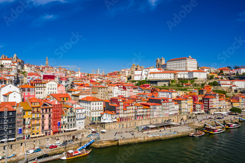Porto Cityscape with Dom Luis I Bridge over Douro River and medieval Ribeira district at day time, Portugal © -Marcus-