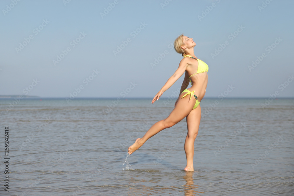 young girl in a bathing suit young girl in a bathing suit