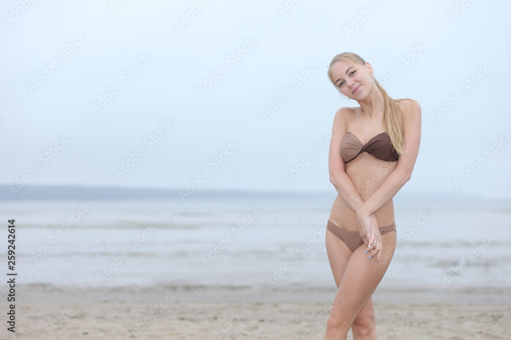 young girl in a bathing suit young girl in a bathing suit