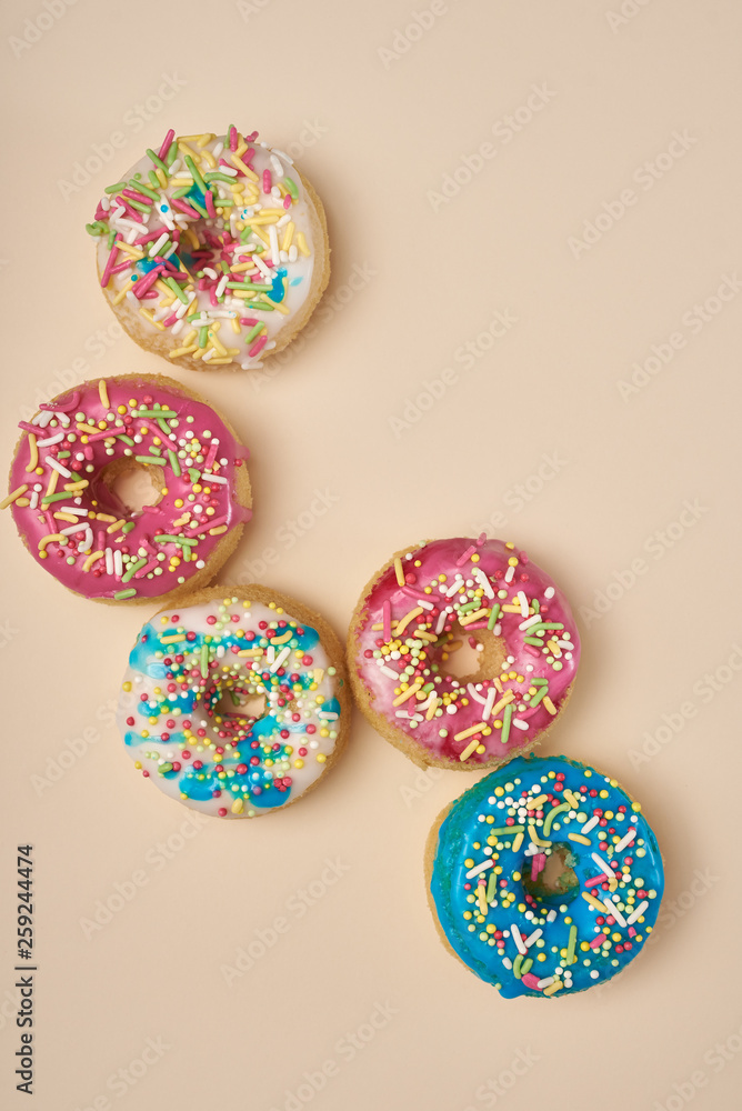 Glazed donuts on pastel background. Glazed donuts on pastel background.