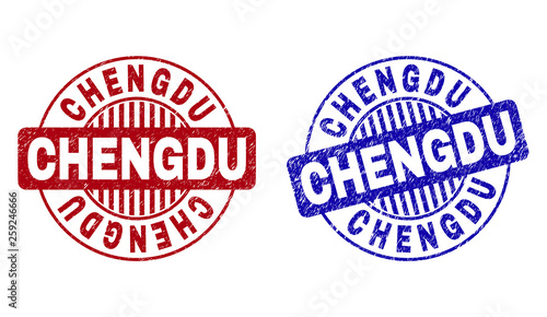 Grunge CHENGDU round stamp seals isolated on a white background. Round seals with grunge texture in red and blue colors. Vector rubber imprint of CHENGDU caption inside circle form with stripes.