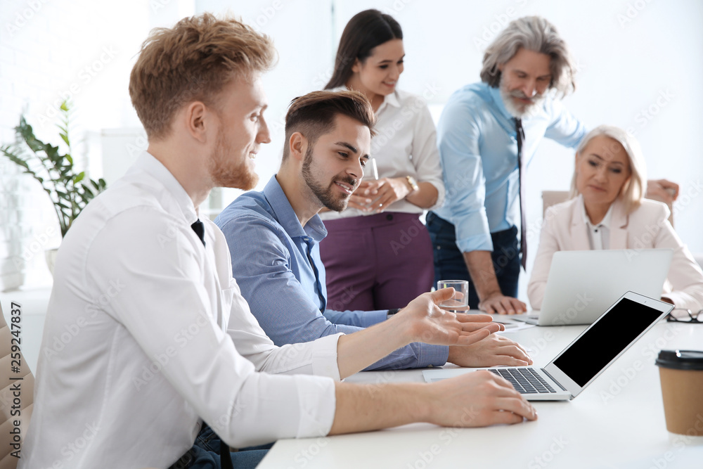 Business people discussing work matters in office. Professional communication Business people discussing work matters in office. Professional communication