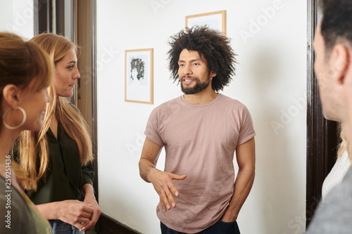 Man telling the story to his friends at home.