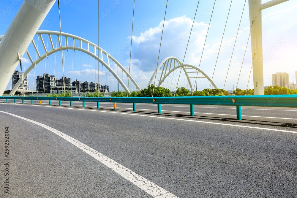 Fototapeta premium Empty asphalt road and bridge construction in shanghai