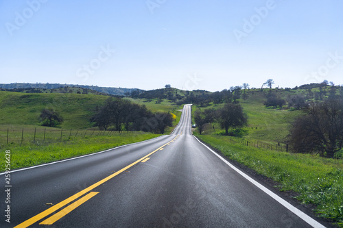 Driving through the countryside on a sunny spring day,