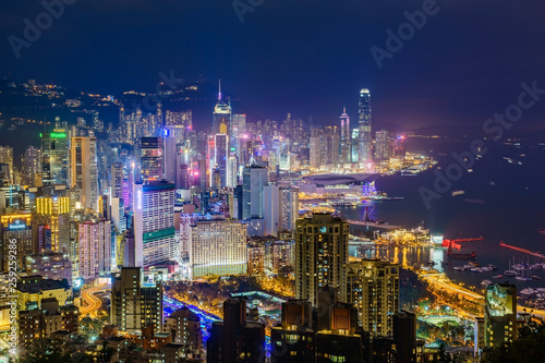 Amazing panoramic view of Hong Kong city skyline before sunset. Viewpoint from Braemar Hill peak, Hong Kong. © navintar