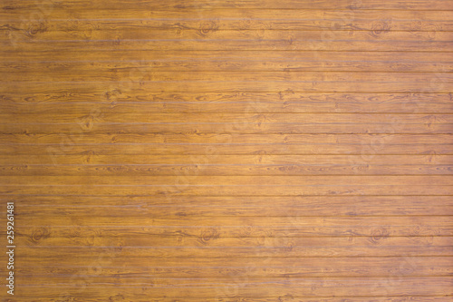 yellow gray wooden plank fence. horizontal lines. rough surface texture