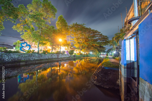 River on the edge of town Night photo Location of poor East Java Indonesia