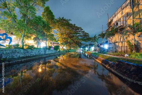 River on the edge of town Night photo Location of poor East Java Indonesia