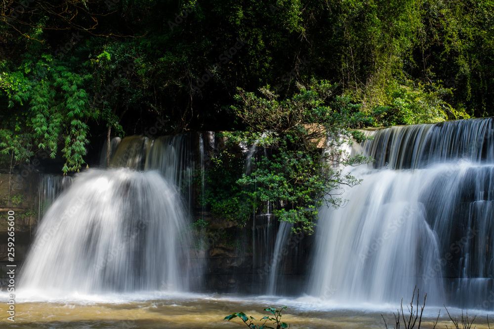 Beautiful waterfall in natural 'Si Dit Waterfall' with blue sky in khao kho national park 