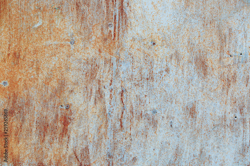 Rusty metal texture with natural defects. Scratches, grungy, cracks, corrosion. Can be used as a background or poster for an inscription.