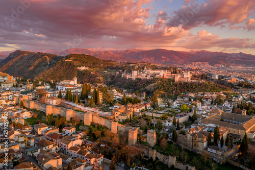 Granada Alhambra medieval palace castle at sunset aerial view