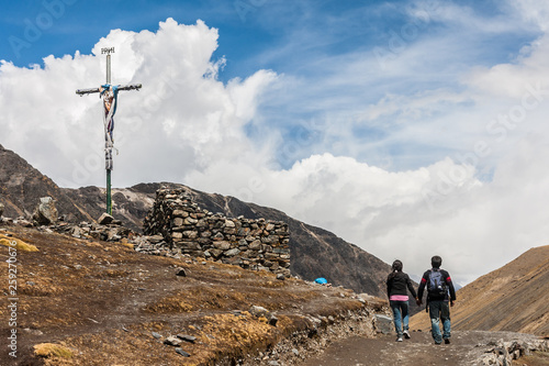 Billede på lærred Couple holding hands walking at pilgrimage of lord of Coyllority, in Cusco Peru