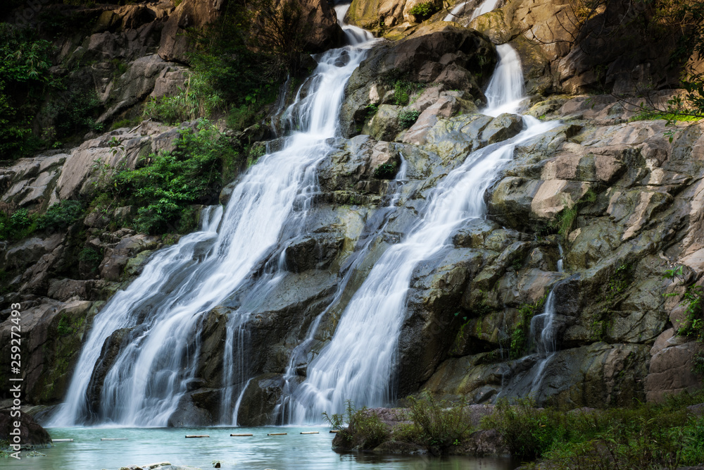 Beautiful waterfall in green forest