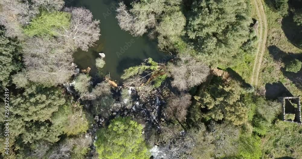 Aerial view by drone, with river landscape, Dão river on valley and banks with typical Portuguese vegetation, on the mountains, in north Portugal Aerial view by drone, with river landscape, Dão river on valley and banks with typical Portuguese vegetation, on the mountains, in north Portugal