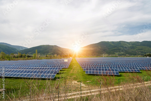 Solar panels, photovoltaics, alternative electricity source. View of a solar station at the foothills of a mountain - concept of sustainable resources