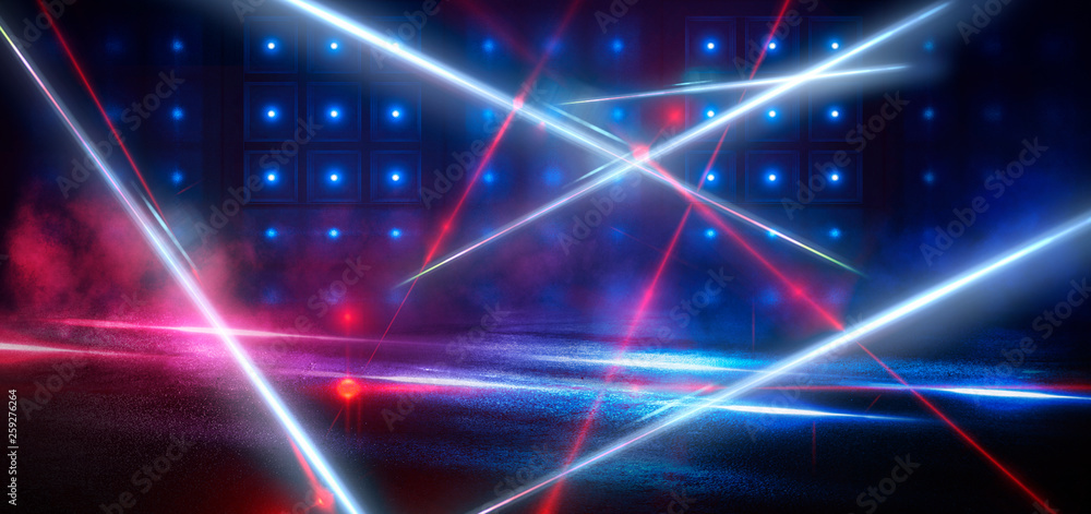 Dark street, reflection of neon light on wet asphalt. Rays of light and red laser light in the dark. Night view of the street, the city. Abstract dark blue background. Dark street, reflection of neon light on wet asphalt. Rays of light and red laser light in the dark. Night view of the street, the city. Abstract dark blue background.