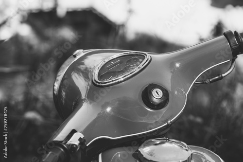 Black and white photo vintage scooter close up photo