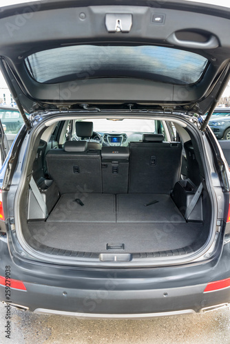 Clean, open empty trunk in the car SUV. Transformation of the seats for carrying luggage in the cabin. © Kanstantsin