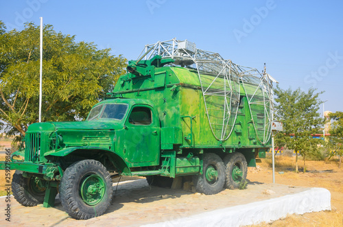 green military truck with radar