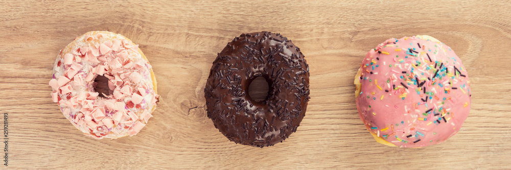 tree tasty donuts on wooden table panorama tree tasty donuts on wooden table panorama