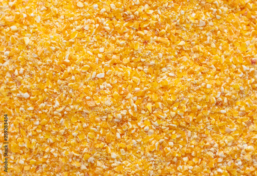 Cornmeal mush in a white saucer on a gray concrete background Cornmeal mush in a white saucer on a gray concrete background