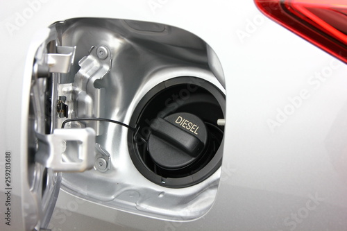 diesel cover flue tank.when the driver want to reflue gasoline ,he open the cover oil tank and put gasoline inside.