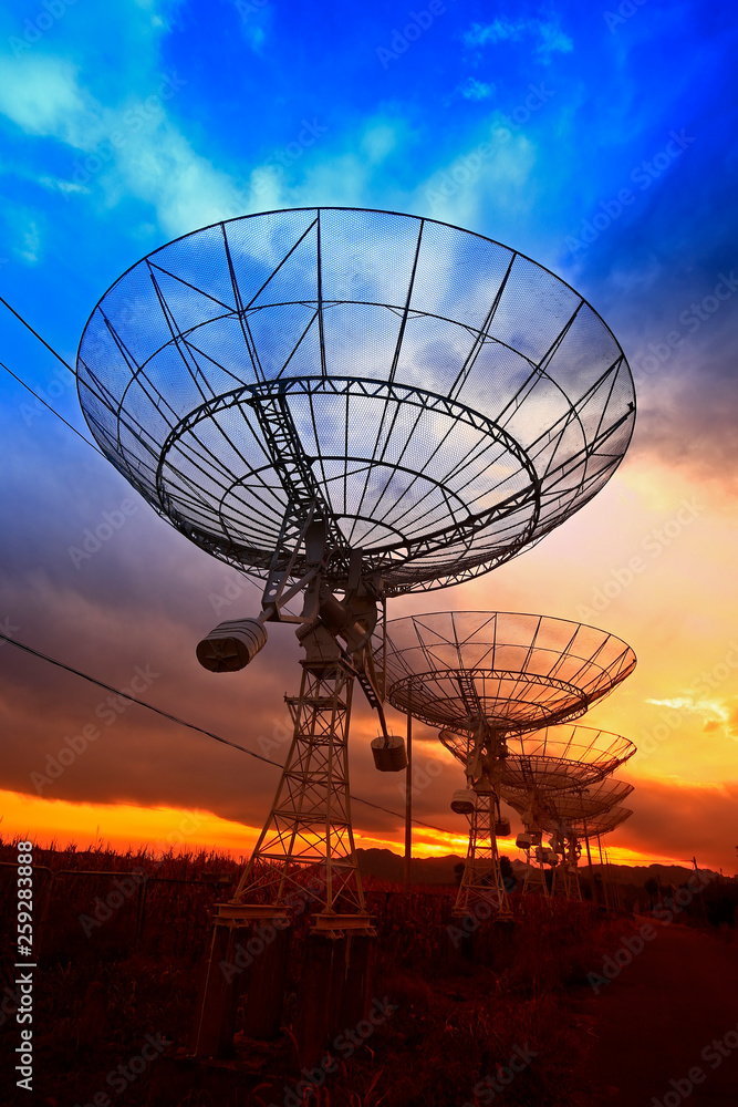 The silhouette of a radio telescope observatory The silhouette of a radio telescope observatory