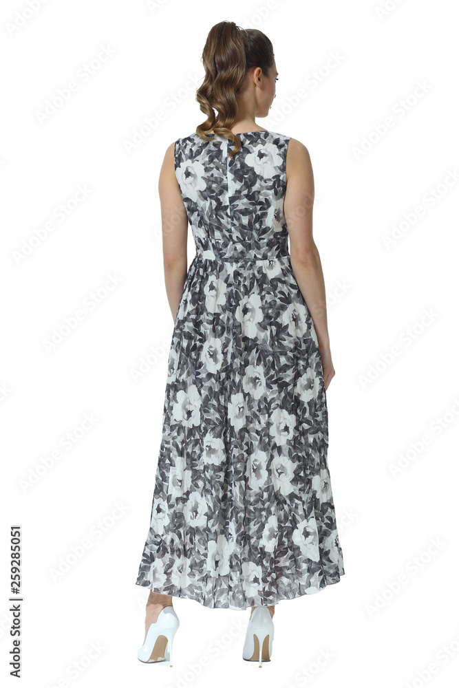 young caucasian business woman executive posing in summer sleeveless floral print dress young caucasian business woman executive posing in summer sleeveless floral print dress