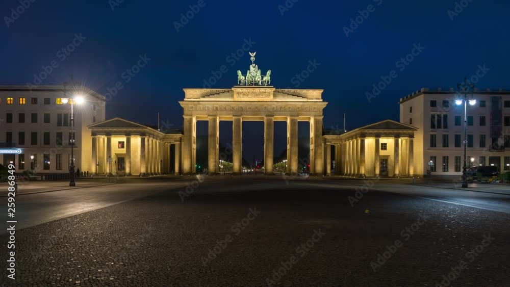 Night to day time lapse transition of the Brandenburg Gate, Berlin, Germany Night to day time lapse transition of the Brandenburg Gate, Berlin, Germany
