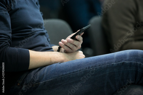 man  student  businessman sitting with a phone