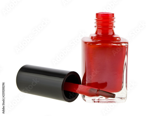 Obraz na plátně bottle with red nail polish isolated on white background close up